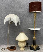 A brass and mahogany floor standing lamp, a neoclassical style ceramic urn table lamp and a
