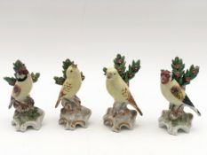 Two pairs of bird figures, bearing Chelsea gold anchor marks, possibly 18th century. H.12cm (