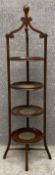 An Edwardian mahogany four tier cake stand. H.112cm.