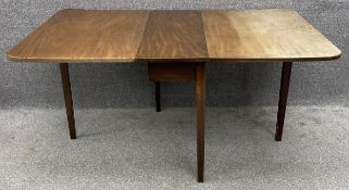 A 19th century mahogany drop flap dining table with gate-leg action. H.72 W.33 (156 extended) D.