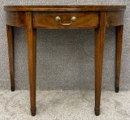 A Georgian mahogany fold over top tea table on double gate-leg action supports. H.70 W.92 D.91cm.