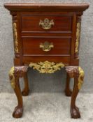 A contemporary Georgian style small cest with carved giltwood decoration, on cabriole legs with ball