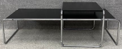 A nest of two Laccio coffee tables after a design by Marcel Breuer in black laminate and chrome. H.