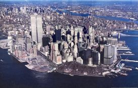 A large format photograph of 1980's Manhattan from the air, framed and glazed. H.64 W.94cm.