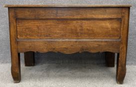 An 18th century country oak panelled coffer on stile supports. H.77 W.112 D.53cm