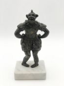 An early 20th century cold painted brass figure of a laughing clown on a marble plinth. H.17 W.13cm.