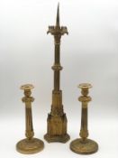 A pair of gilt metal candlesticks and a Gothic pricket candlestick. H.62cm (largest).
