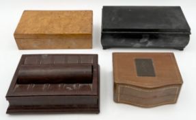 A collection of four boxes, viz: one bakelite, one birdseye maple, one to include a travel chess set