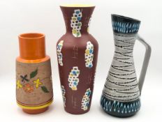 Two mid century vases and a similar jug, one marked West Germany. H.41cm (largest).