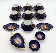 A Limoges porcelain part coffee service comprising seven coffee cans and saucers, and five dishes;
