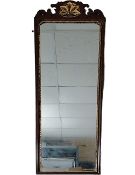 A Georgian mahogany and carved giltwood pier mirror with it's original plate. H.168.5 W.46.5cm