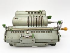 A mid century West German Schubert Rastatt mechanical calculator with maker's labels and it's