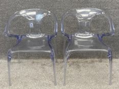 A pair of contemporary AVA translucent injection moulded chairs designed by Song Wen Zhong for Roche