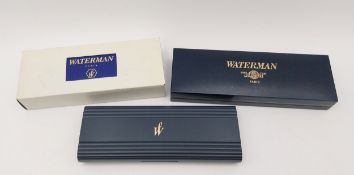 Two Waterman fountain pens along with a similar ball point pen and a pencil. L.14cm (largest)