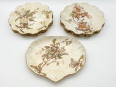 A collection of 19th century hand painted Doulton Burslem china plates with floral decoration and