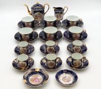 A Limoges porcelain tea and coffee service comprising six coffee cans with saucers, six tea cups
