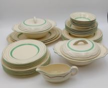 Clarice Cliff for Newport Pottery Co., a 1930's dinner service for six, a total of 35 pieces.