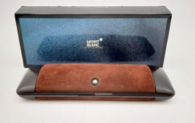 Three Mont Blanc fountain pens, one with a 14ct gold nib. L.14cm