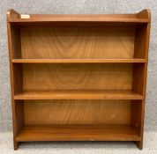 A mid-century teak open bookshelf. H.98 W.92 D.23cm.