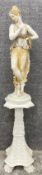 An antique style cast plaster classical figure on a moulded plinth base. H.123cm