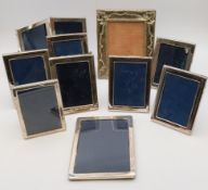 A collection of eight silver plated photograph frames along with a folding similar and a copper