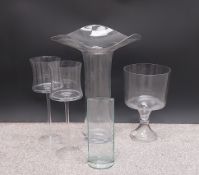 Five large miscellaneous glass florist's vases. H.47cm (tallest) Dia.36cm