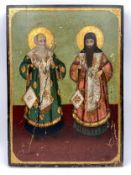 A 19th century Greek icon in oil and tempura on panel, depicting two saints with gilt halos. H.49