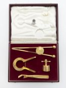A four piece set of gold plated bar tools by Asprey in their original fitted case. H.5 W.23.5 D.18.