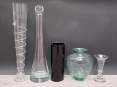 A collection of five miscellaneous glass florist's vases to include one with an applied glass