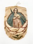 A hand carved and painted alabaster wall hanging relief depicting Saint John the Baptist holding a