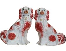 A pair of 19th century Staffordshire dogs, marked to base. H.32cm