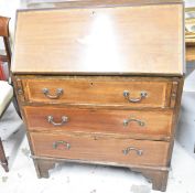 An Edwardian mahogany and satinwood inlaid bureau. H.96 W.76 D.39cm