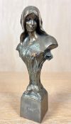 A Giovanni Schoeman style Art Nouveau bust of a young girl, Ethne, stamped to base. H.21cm