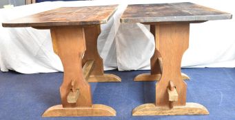 A pair of mid century 18th century style oak side tables on trestle supports. H.74 L.106 D.59cm