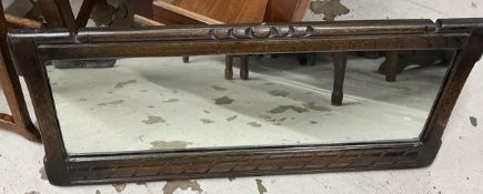 A mid century Ercol oak framed mirror. H.33 W.77cm