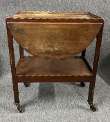 A vintage mahogany trolley. H.70 W.41 Extended 90 D.62cm
