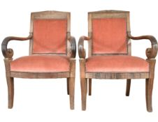 A pair of 19th century mahogany French Empire armchairs.