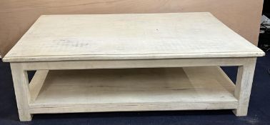 A distressed painted two tier coffee table. H.45 W.195 D.99cm