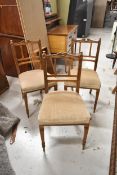 Three Victorian carved walnut chairs.