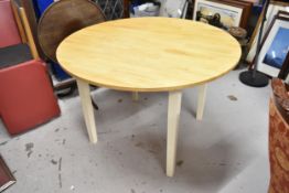 A contemporary painted and beech topped kitchen table. H.75 D.90cm