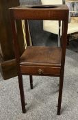A Georgian mahogany washstand. H.87 W.33 D.34cm