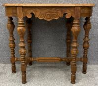 A continental style maple centre or side table. H.74 W.86 D.54cm