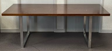A 1970's vintage teak dining table on chrome supports. H.72 W.201 D.101cm (Some surface scratches,