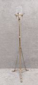 A 19th century brass standard lamp, converted for electricity. H.107 W.50cm