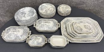 A 19th century part dinner service to include twelve dinner plates, graduated serving platters,