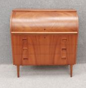 Egon Ostergaard for SMI Sweden, a mid century teak cylinder bureau with fitted interior. H.96 W.90