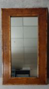 A large contemporary walnut framed dressing or wall mirror. H.200 W.100 D.4cm