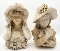 An pair of Art Nouveau alabaster busts of young girls in hats. H.41cm. (Chips and damage as seen).