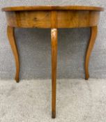 A 19th century continental walnut demi lune console table in the Beidermeier style. H.77 W.85 D.
