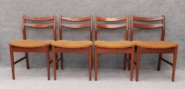 A set of four mid century Jentique dining chairs in original upholstery. H.77cm each